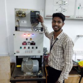 student controlling induction motor using VFD